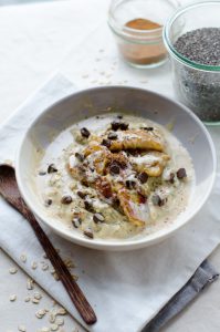 Chocolate oat cereal porridge with fresh fruits.